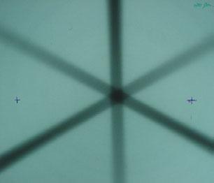 +3 cm film -3 cm film Figure 10. Two films taken to test multileaf and gantry synchrony, showing the fields planned to lie at 0, 120 and 240 to the (marked) horizontal.