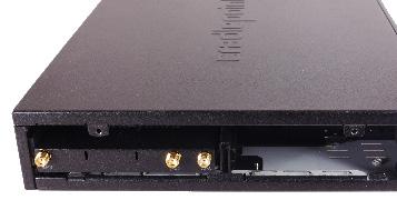 Slide the modem into the side of the router (left slot