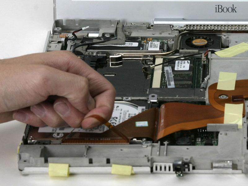 Step 33 At the front edge of the hard drive, lift up on the